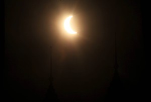 With Solar Eclipse is seen above the  Kuala Lumpur Twin  towers. AZHAR MAHFOF/The Star